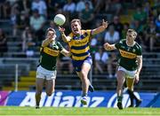 17 May 2025; Enda Smith of Roscommon in action against Gavin White and Dylan Casey of Kerry during the GAA Football All-Ireland Senior Championship Round 1 match between Kerry and Roscommon at Fitzgerald Stadium in Killarney, Kerry. Photo by Brendan Moran/Sportsfile