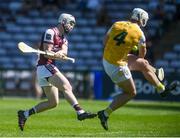 17 May 2025; Joshua Ryan of Galway has a shot on goal blocked by Paddy Burke of Antrim during the Leinster GAA Hurling Senior Championship Round 4 match between Galway and Antrim at Pearse Stadium in Galway. Photo by John Sheridan/Sportsfile