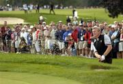 17 September 2004; Colin Montgomerie, Team Europe 2004, plays from the bunker onto the 3rd green during the Friday Morning Four-Ball. 35th Ryder Cup Matches, Oakland Hills Country Club, Bloomfield Township, Michigan, USA. Picture credit; Matt Browne / SPORTSFILE