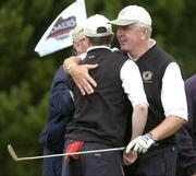 17 September 2004; Pat Nalty, right, embraces his Ballinrobe Golf Club playing partner John O'Shea after winning the deciding match on the 18th. Bulmers Pierce Purcell Shield Final, Ballinrobe Golf Club v Tralee Golf Club, Shannon Golf Club, Shannon, Co. Clare. Picture credit; Ray McManus / SPORTSFILE
