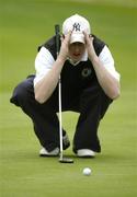 17 September 2004; John O'Shea, Ballinrobe Golf Club, lines up a putt on the 16th. Bulmers Pierce Purcell Shield Final, Ballinrobe Golf Club v Tralee Golf Club, Shannon Golf Club, Shannon, Co. Clare. Picture credit; Ray McManus / SPORTSFILE