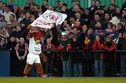 11 September 2004; The Ulster rugby mascot &quot;Sparky&quot; leads the cheers. Celtic League 2004-2005, Ulster v Leinster, Ravenhill Park, Belfast. Picture credit; Brendan Moran / SPORTSFILE