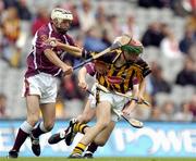 12 September 2004; Shane Prendergast, Kilkenny, in action against Daniel Whyte and Finian Coonen, Galway. All-Ireland Minor Hurling Championship Final, Galway v Kilkenny, Croke Park, Dublin. Picture credit; Brendan Moran / SPORTSFILE *** Local Caption *** Any photograph taken by SPORTSFILE during, or in connection with, the 2004 Guinness All-Ireland Hurling Final which displays GAA logos or contains an image or part of an image of any GAA intellectual property, or, which contains images of a GAA player/players in their playing uniforms, may only be used for editorial and non-advertising purposes.  Use of photographs for advertising, as posters or for purchase separately is strictly prohibited unless prior written approval has been obtained from the Gaelic Athletic Association.
