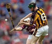 12 September 2004; Ronan Maher, Kilkenny, in action against Finian Coonen, Galway. All-Ireland Minor Hurling Championship Final, Galway v Kilkenny, Croke Park, Dublin. Picture credit; Brendan Moran / SPORTSFILE *** Local Caption *** Any photograph taken by SPORTSFILE during, or in connection with, the 2004 Guinness All-Ireland Hurling Final which displays GAA logos or contains an image or part of an image of any GAA intellectual property, or, which contains images of a GAA player/players in their playing uniforms, may only be used for editorial and non-advertising purposes.  Use of photographs for advertising, as posters or for purchase separately is strictly prohibited unless prior written approval has been obtained from the Gaelic Athletic Association.