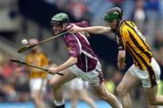 12 September 2004; Kevin Hynes, Galway, in action against Ronan Maher, Kilkenny. All-Ireland Minor Hurling Championship Final, Galway v Kilkenny, Croke Park, Dublin. Picture credit; Brendan Moran / SPORTSFILE *** Local Caption *** Any photograph taken by SPORTSFILE during, or in connection with, the 2004 Guinness All-Ireland Hurling Final which displays GAA logos or contains an image or part of an image of any GAA intellectual property, or, which contains images of a GAA player/players in their playing uniforms, may only be used for editorial and non-advertising purposes.  Use of photographs for advertising, as posters or for purchase separately is strictly prohibited unless prior written approval has been obtained from the Gaelic Athletic Association.
