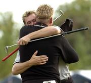 17 September 2004; Lee Westwood and Darren Clarke, Team Europe 2004, celebrate on the 18th green after their win against Woods and Mickleson during the Friday afternoon foursomes. 35th Ryder Cup Matches, Oakland Hills Country Club, Bloomfield Township, Michigan, USA. Picture credit; Matt Browne / SPORTSFILE