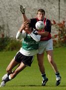 18 September 2004; Setanta O'hAilpin in action against Ciaran McManus during international Rules squad training, St. Clare's GAA Ground, Glasnevin, Dublin. Picture credit; Pat Murphy / SPORTSFILE