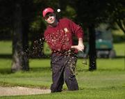 18 September 2004; Robert Forsythe, Ballyclare Golf Club, plays from a bunker at the 10th. Bulmers Senior Cup Final, Tramore Golf Club v Ballyclare Golf Club, Shannon Golf Club, Shannon, Co. Clare. Picture credit; Ray McManus / SPORTSFILE