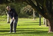 18 September 2004; Michael Coburn, Dundalk Golf Club, plays the third shot on the 2nd hole. Bulmers Jimmy Bruen Shield Final, Dundalk Golf Club v Kilkeel Golf Club, Shannon Golf Club, Shannon, Co. Clare. Picture credit; Ray McManus / SPORTSFILE