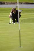 18 September 2004; Clancy Bowe, Tramore  Golf Club, lines up a putt on the 8th green. Bulmers Senior Cup Final, Tramore Golf Club v Ballyclare Golf Club, Shannon Golf Club, Shannon, Co. Clare. Picture credit; Ray McManus / SPORTSFILE