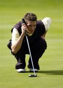 18 September 2004; Clancy Bowe, Tramore Golf Club, lines up a putt on the 8th green. Bulmers Senior Cup Final, Tramore Golf Club v Ballyclare Golf Club, Shannon Golf Club, Shannon, Co. Clare. Picture credit; Ray McManus / SPORTSFILE
