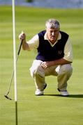 18 September 2004; Michael Burns, Tramore Golf Club, lines up a putt on the 8th. Bulmers Senior Cup Final, Tramore Golf Club v Ballyclare Golf Club, Shannon Golf Club, Shannon, Co. Clare. Picture credit; Ray McManus / SPORTSFILE