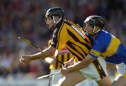 18 September 2004; Conor Phelan, Kilkenny, in action against Conor O'Mahoney, Tipperary. Erin All-Ireland U21 Hurling Championship Final, Kilkenny v Tipperary, Nowlan Park, Kilkenny. Picture credit; Damien Eagers / SPORTSFILE
