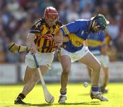 18 September 2004; Tommy Walsh, Kilkenny, in action against Wayne Cully, Tipperary. Erin All-Ireland U21 Hurling Championship Final, Kilkenny v Tipperary, Nowlan Park, Kilkenny. Picture credit; Damien Eagers / SPORTSFILE