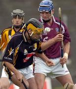 19 September 2004; Liam Tierney, Kilkenny goalkeeper, in action against Keith Kilkenny, Galway. All-Ireland Minor Hurling Championship Final Replay, Kilkenny v Galway, O'Connor Park, Tullamore, Co. Offaly. Picture credit; Damien Eagers / SPORTSFILE