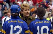 19 September 2004; President Mary McAleese is introduced to Tipperary players Noelle Kennedy, 10, and Claire Grogan before the start of the game Foras na Gaeilge Senior Camogie Championship All-Ireland Final, Tipperary v Cork, Croke Park, Dublin. Picture credit; Ray McManus / SPORTSFILE