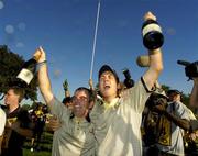 19 September 2004; Paul McGinley and David Howell, right, celebrate on the 18th green after Europe had won the Ryder Cup. 35th Ryder Cup Matches, Oakland Hills Country Club, Bloomfield Township, Michigan, USA. Picture credit; Matt Browne / SPORTSFILE
