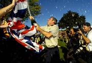 19 September 2004; Paul McGinley celebrates on the 18th green after Europe had won the Ryder Cup. 35th Ryder Cup Matches, Oakland Hills Country Club, Bloomfield Township, Michigan, USA. Picture credit; Matt Browne / SPORTSFILE