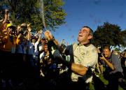 19 September 2004; Paul McGinley celebrates on the 18th green after Europe had won the Ryder Cup. 35th Ryder Cup Matches, Oakland Hills Country Club, Bloomfield Township, Michigan, USA. Picture credit; Matt Browne / SPORTSFILE