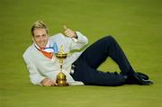 19 September 2004; Ian Poulter pictured with the Ryder Cup. 35th Ryder Cup Matches, Oakland Hills Country Club, Bloomfield Township, Michigan, USA. Picture credit; Matt Browne / SPORTSFILE