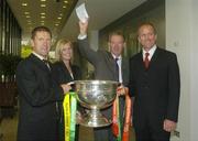 20 September 2004; Michael O'Muircheartaigh draws the winning prize of two tickets to the Bank of Ireland All Ireland Football Final in the Bank of Ireland ATM Retailers competition, also pictured is Mary Cully, Bank of Ireland ATM Sales Manager, John Maughan, Mayo manager, right, and Jack O'Connor, Kerry manager, before a press conference in advance of the Bank of Ireland Senior Football Championship Final. Bank of Ireland Head Office, Baggot Street, Dublin. Picture credit; Damien Eagers / SPORTSFILE
