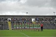 6 October 2013; The St Brigid's team during the National Anthem. Roscommon County Senior Club Football Championship Final, St Brigid's v Western Gaels, Dr. Hyde Park, Roscommon. Picture credit: Pat Murphy / SPORTSFILE