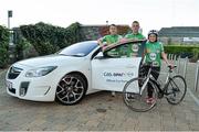10 October 2013; Opel Ireland Managing Director Dave Sheeran, left, Dublin footballer Paul Mannion and Neasa O'Se before setting off from Croke Park as they begin the first leg of the Paidi O Se Charity Cycle Sportive. The inaugural three day cycle from Croke Park to Ventry is sponsored by Opel, supported by Cuisine de France and running from October 10th - 12th to raise money for cardiac services, through Fundúireacht Páidí Ó Sé. For more information on the Paidi Ó Sé Charity Cycle Sportive log on to paidiose.com. Croke Park, Dublin. Picture credit: Barry Cregg / SPORTSFILE