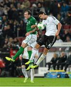 11 October 2013; Anthony Stokes, Republic of Ireland, in action against Sami Khedira, Germany. 2014 FIFA World Cup Qualifier, Group C, Germany v Republic of Ireland, Rhine Energie Stadion, Cologne, Germany. Picture credit: David Maher / SPORTSFILE