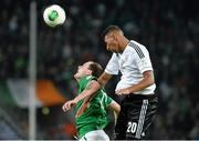 11 October 2013; Anthony Stokes, Republic of Ireland, in action against Jérôme Boateng, Germany. 2014 FIFA World Cup Qualifier, Group C, Germany v Republic of Ireland, Rhine Energie Stadion, Cologne, Germany. Picture credit: David Maher / SPORTSFILE