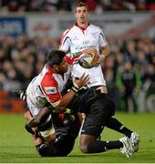11 October 2013; Nick Williams, Ulster, is tackled by Niall Morris and Miles Benjamin, Leicester Tigers. Heineken Cup 2013/14, Pool 5, Round 1, Ulster v Leicester Tigers, Ravenhill Park, Belfast, Co. Antrim. Picture credit: Oliver McVeigh / SPORTSFILE