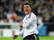 11 October 2013; Mesut Ozil, Germany, celebrates after scoring his side's third goal. 2014 FIFA World Cup Qualifier, Group C, Germany v Republic of Ireland, Rhine Energie Stadion, Cologne, Germany. Picture credit: David Maher / SPORTSFILE