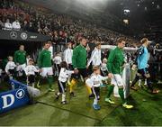 11 October 2013; Republic of Ireland captain Seamus Coleman leads his side out for the strat of the game. 2014 FIFA World Cup Qualifier, Group C, Germany v Republic of Ireland, Rhine Energie Stadion, Cologne, Germany. Picture credit: David Maher / SPORTSFILE