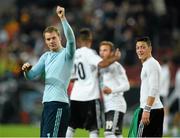 11 October 2013; Manuel Neuer, left and Musut Ozil, Germany, celebrate at the end of the game. 2014 FIFA World Cup Qualifier,  Group C, Germany v Republic of Ireland, Rhine Energie Stadion, Cologne, Germany. Picture credit: David Maher / SPORTSFILE