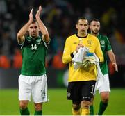 11 October 2013; David Forde and Darron Gibson, Republic of Ireland, at the end of the game. 2014 FIFA World Cup Qualifier,  Group C, Germany v Republic of Ireland, Rhine Energie Stadion, Cologne, Germany. Picture credit: David Maher / SPORTSFILE