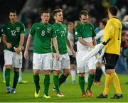 11 October 2013; Republic of Ireland players, from left, Stephen Kelly, James McCarthy, Kevin Doyle, Glenn Whelan and David Forde at the end of the game. 2014 FIFA World Cup Qualifier,  Group C, Germany v Republic of Ireland, Rhine Energie Stadion, Cologne, Germany. Picture credit: David Maher / SPORTSFILE