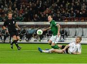 11 October 2013; Anthony Stokes, Republic of Ireland, in action against Per Mertesacker, Germany. 2014 FIFA World Cup Qualifier,  Group C, Germany v Republic of Ireland, Rhine Energie Stadion, Cologne, Germany. Picture credit: David Maher / SPORTSFILE