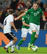 11 October 2013; Anthony Stokes, Republic of Ireland, in action against Philipp Lahm, Germany. 2014 FIFA World Cup Qualifier,  Group C, Germany v Republic of Ireland, Rhine Energie Stadion, Cologne, Germany. Picture credit: David Maher / SPORTSFILE