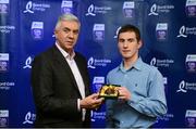 12 October 2013; Selected at midfield on the inaugural Bord Gáis Energy Under 21 Team of the Year is Colm Galvin, Clare. The Clonlara clubman has had a sensational year at Under 21 and Senior and is one of eight Clare players selected on the Team of the Year for 2013 in recognition of their achievement in retaining their All-Ireland crown. Pictured with Colm is Ger Cunningham, Bord Gáis Energy Ambassador and Team of the Year Judge. Bord Gáis Energy All-Ireland GAA Hurling Under 21 Team of the Year Awards, Croke Park, Dublin. Photo by Sportsfile
