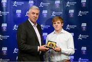 12 October 2013; The centre half forward on the inaugural Bord Gáis Energy Under 21 Team of the Year is Pádraic Collins, Clare. The Cratloe clubman had a superb year at Under 21 as the focal point of many a Clare attack and is one of eight Clare players selected on the Team of the Year for 2013 in recognition of their achievement in retaining their All-Ireland crown. Pictured with Pádraic is Ger Cunningham, Bord Gáis Energy Ambassador and Team of the Year Judge. Bord Gáis Energy All-Ireland GAA Hurling Under 21 Team of the Year Awards, Croke Park, Dublin. Photo by Sportsfile