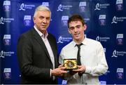 12 October 2013; The left corner forward on the inaugural Bord Gáis Energy Under 21 Team of the Year is Ciarán Clarke, Antrim. In a historic year for Antrim hurling, sharp-shooter Clarke was inspirational scoring 1-4 on that historic day against Wexford in Semple Stadium. Pictured with Ciarán is Ger Cunningham, Bord Gáis Energy Ambassador and Team of the Year Judge. Bord Gáis Energy All-Ireland GAA Hurling Under 21 Team of the Year Awards, Croke Park, Dublin. Photo by Sportsfile