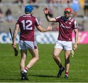 17 May 2025; Galway players, from left, Conor Cooney and TJ Brennan after the Leinster GAA Hurling Senior Championship Round 4 match between Galway and Antrim at Pearse Stadium in Galway. Photo by John Sheridan/Sportsfile