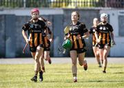 17 May 2025; Kilkenny players run out for the warm up before the Leinster Senior Camogie final match between Wexford and Kilkenny at Netwatch Cullen Park in Carlow. There are no match action pictures from this game at the request of the participating players. Photo by Michael P Ryan/Sportsfile