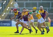 17 May 2025; Cian Byrne of Wexford in action against Donal Shirley of Offaly during the Leinster GAA Hurling Senior Championship Round 4 match between Wexford and Offaly at Chadwicks Wexford Park in Wexford. Photo by Matt Browne/Sportsfile