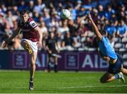 17 May 2025; Matthew Tierney of Galway gets a shot off despite the efforts of Theo Clancy of Dublin during the GAA Football All-Ireland Senior Championship Round 1 match between Galway and Dublin at Pearse Stadium in Galway. Photo by John Sheridan/Sportsfile