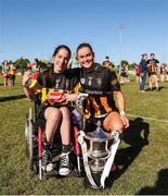 17 May 2025; Kilkenny captain Katie Power poses for a picture with Kilkenny supporter Katie Lonergan after the Leinster Senior Camogie final match between Wexford and Kilkenny at Netwatch Cullen Park in Carlow. There are no match action pictures from this game at the request of the participating players. Photo by Michael P Ryan/Sportsfile