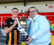 17 May 2025; Chairperson of the Leinster camogie association Martin Quilty presents the cup to Kilkenny captain Katie Power after the Leinster Senior Camogie final match between Wexford and Kilkenny at Netwatch Cullen Park in Carlow. There are no match action pictures from this game at the request of the participating players. Photo by Michael P Ryan/Sportsfile