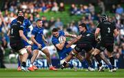 17 May 2025; Jack Conan of Leinster is tackled by Macenzzie Duncan of Glasgow Warriors during the United Rugby Championship match between Leinster and Glasgow Warriors at the Aviva Stadium in Dublin. Photo by Ramsey Cardy/Sportsfile