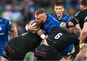 17 May 2025; RG Snyman of Leinster is tackled by Seb Stephen, left, and Macenzzie Duncan of Glasgow Warriors during the United Rugby Championship match between Leinster and Glasgow Warriors at the Aviva Stadium in Dublin. Photo by Ramsey Cardy/Sportsfile