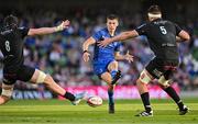 17 May 2025; Sam Prendergast of Leinster in action against Euan Ferrie, left, and Alex Samuel of Glasgow Warriors during the United Rugby Championship match between Leinster and Glasgow Warriors at the Aviva Stadium in Dublin. Photo by Sam Barnes/Sportsfile