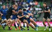 17 May 2025; Scott Penny of Leinster is tackled by Ben Afshar of Glasgow Warriors during the United Rugby Championship match between Leinster and Glasgow Warriors at the Aviva Stadium in Dublin. Photo by Ramsey Cardy/Sportsfile